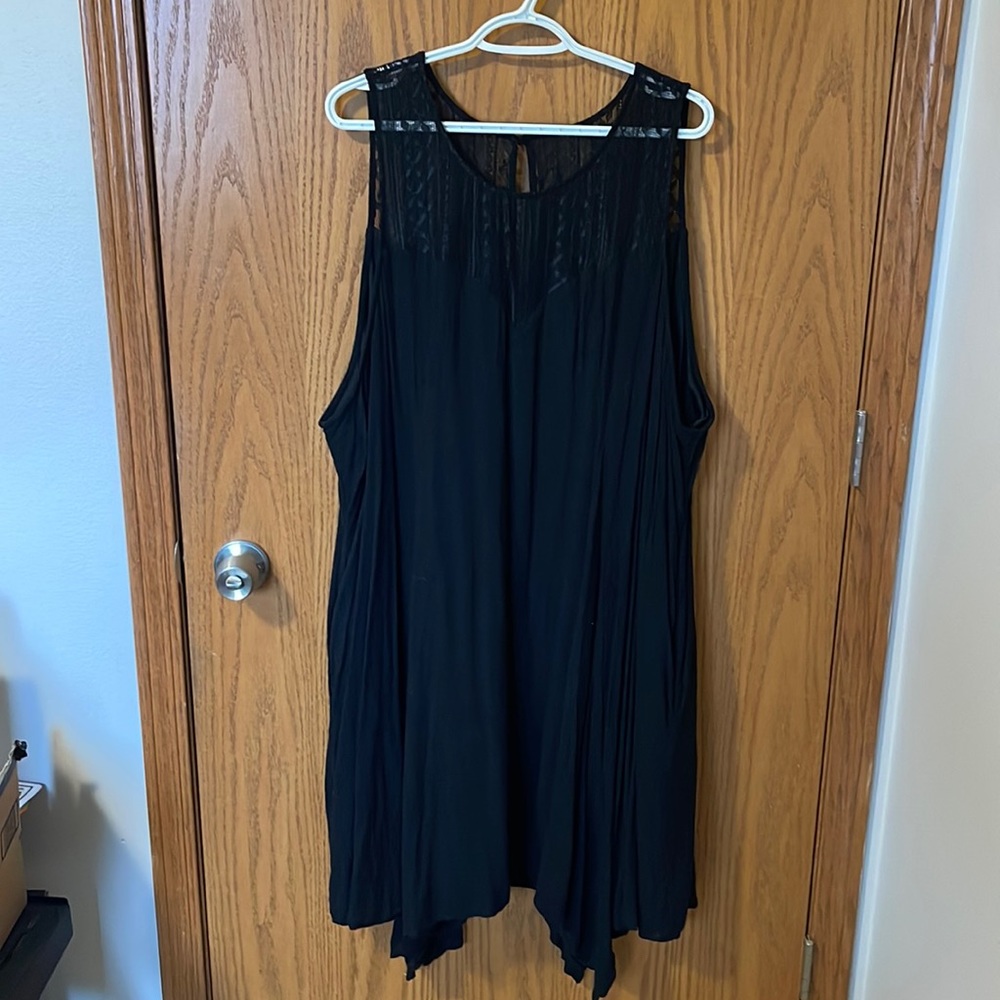 Black torrid dress. Sleeveless and lacy top.